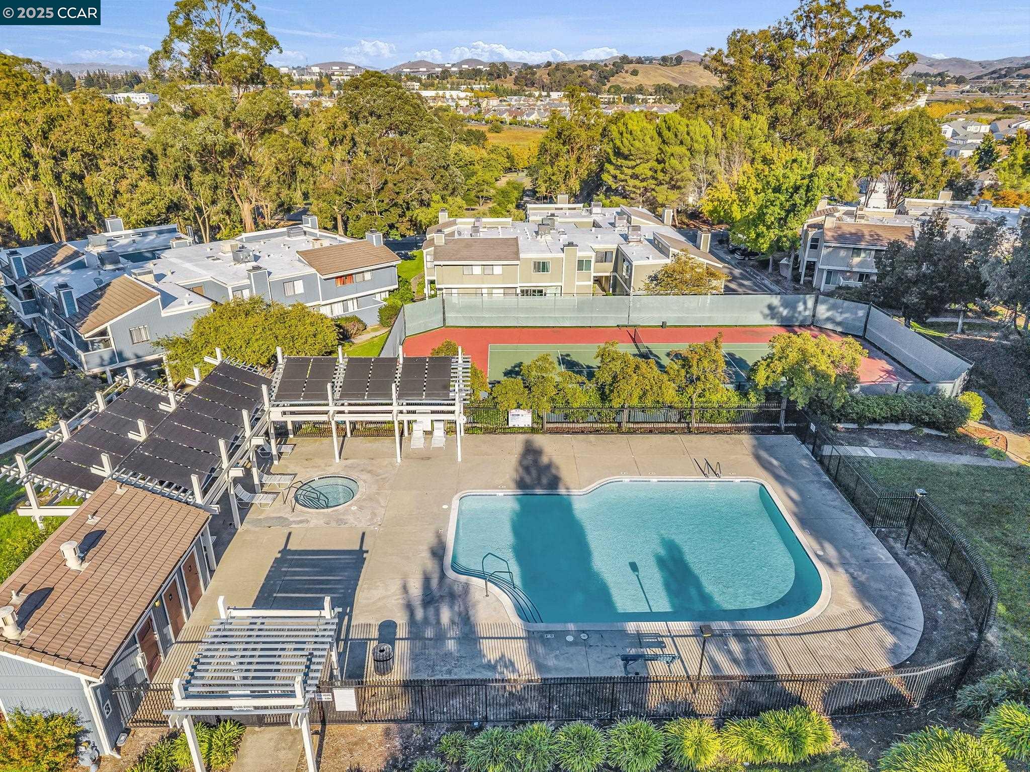 406 Olympus, Unit 5 Hercules, CA 94547 - Photo 43 of 49 an aerial view of residential houses with outdoor space and swimming pool