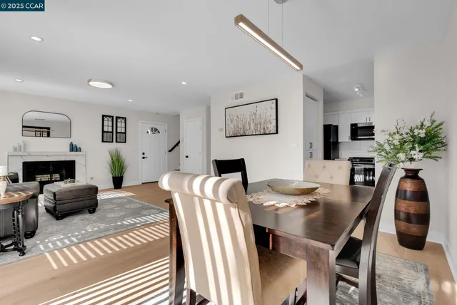 a view of a dining room with furniture