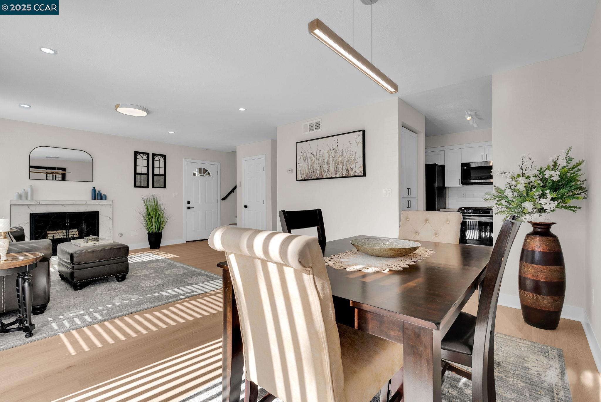 406 Olympus, Unit 5 Hercules, CA 94547 - Photo 8 of 49 a view of a dining room with furniture