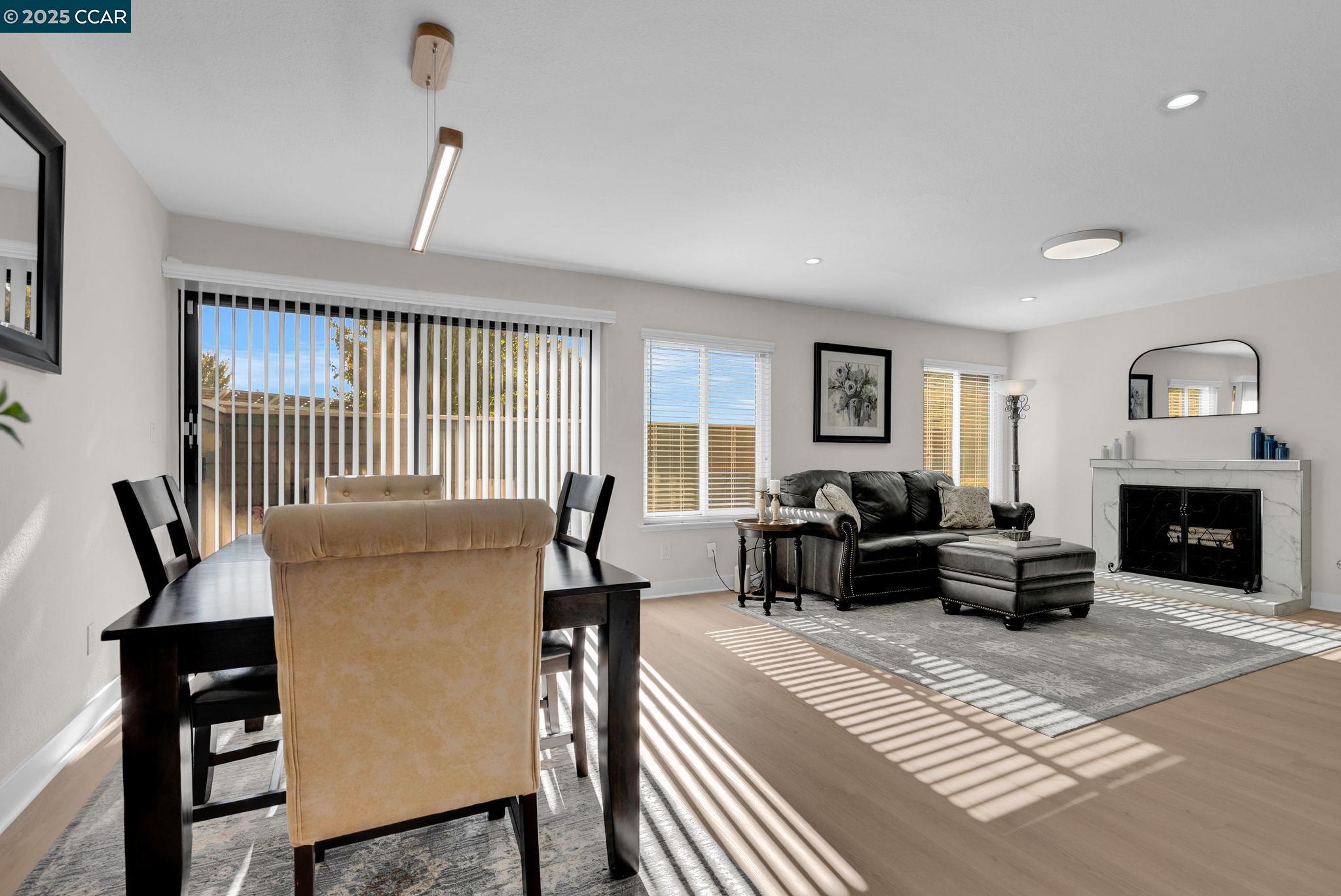 406 Olympus, Unit 5 Hercules, CA 94547 - Photo 10 of 49 a bedroom with furniture and a fireplace