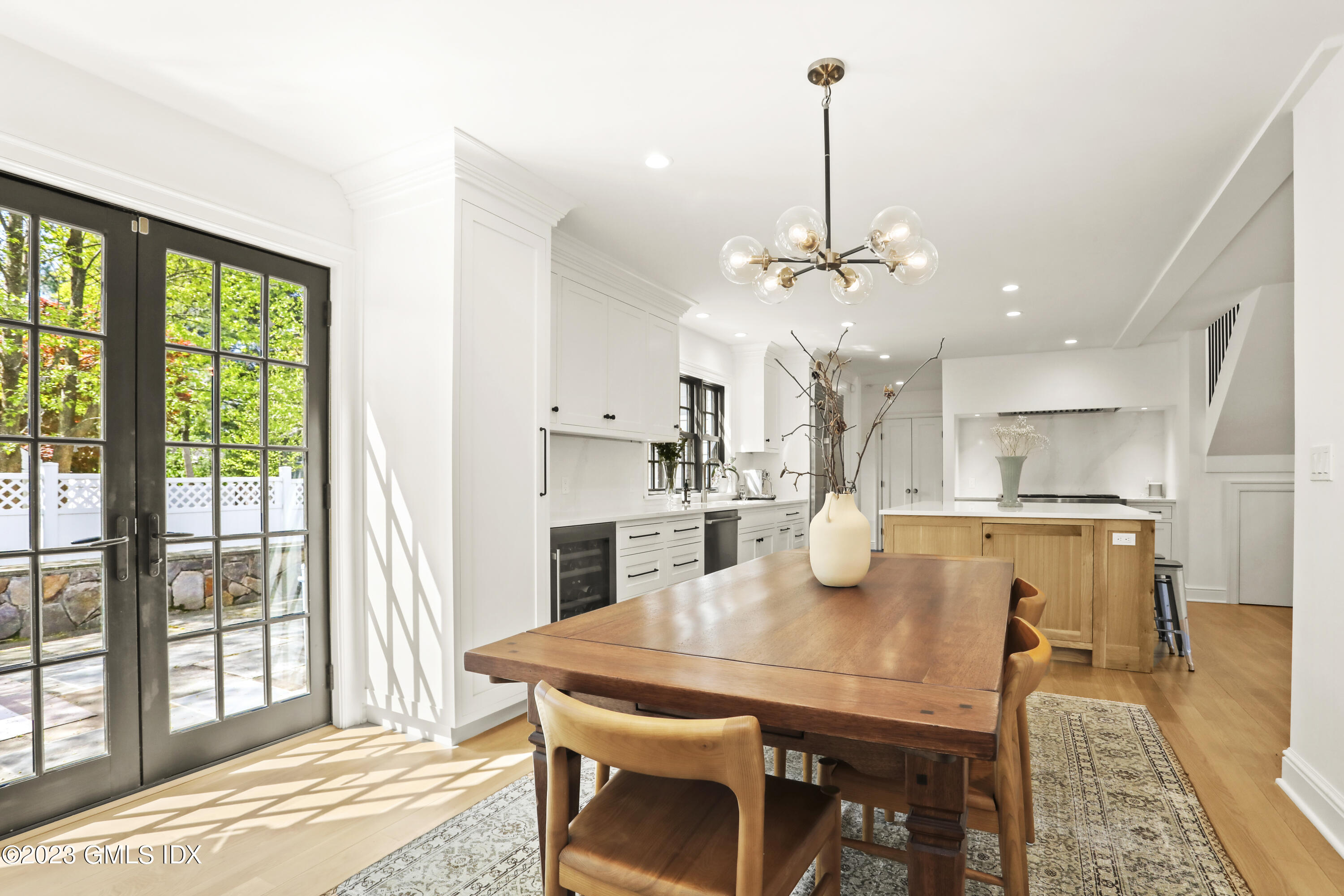 2 Northridge Road Old Greenwich, CT 06870 - Photo 11 of 43 a view of a dining room with furniture window and wooden floor