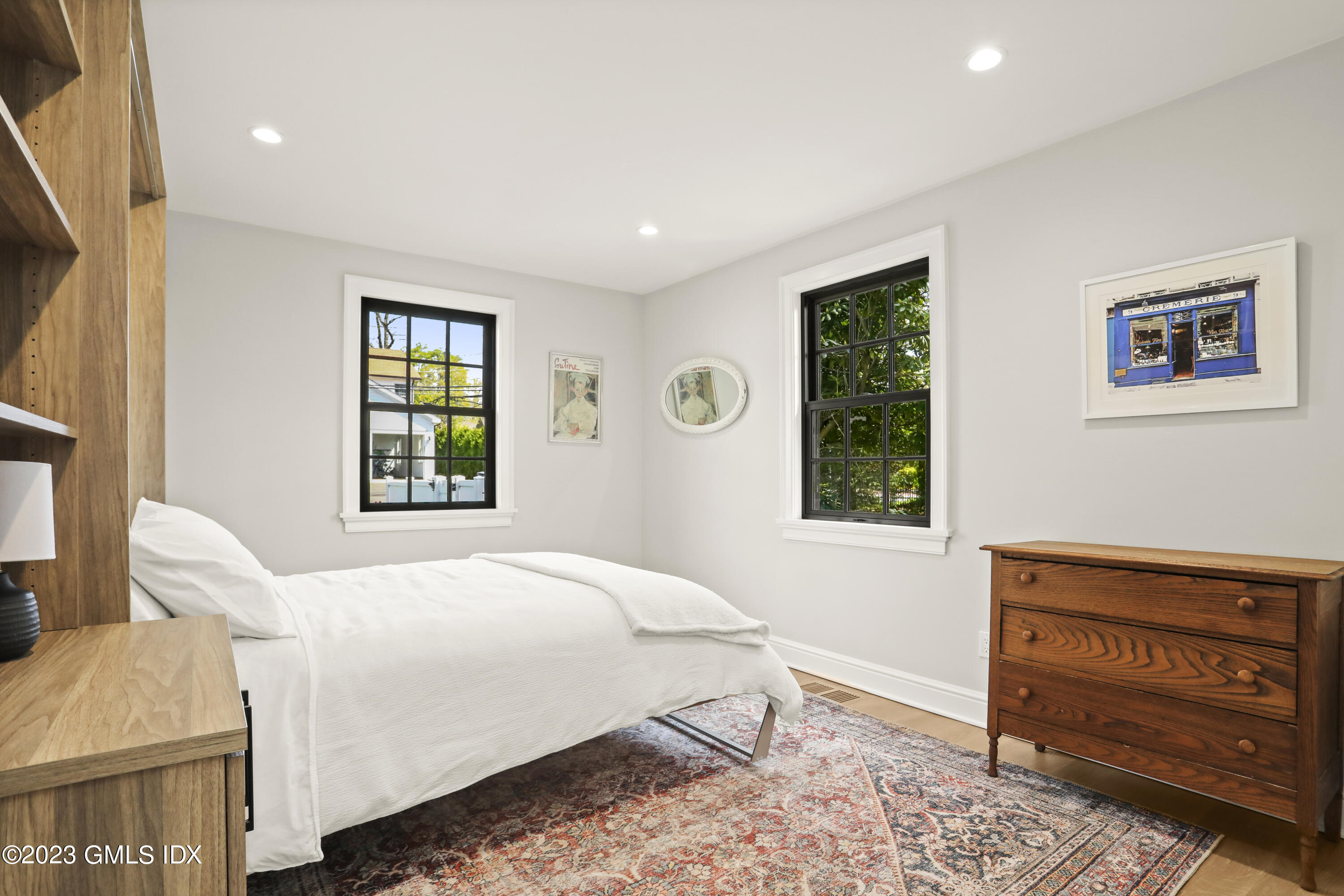 2 Northridge Road Old Greenwich, CT 06870 - Photo 14 of 43 a bedroom with a bed and a window