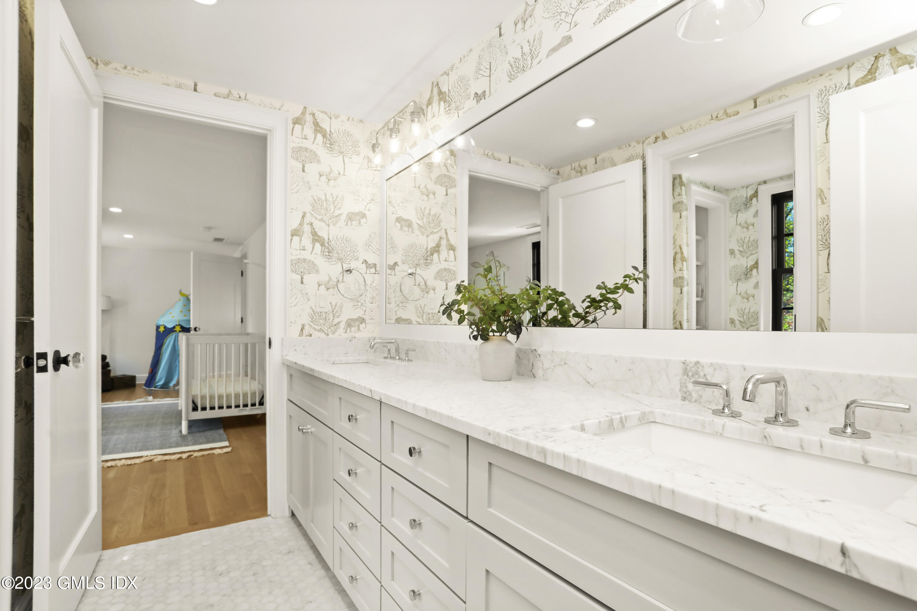 2 Northridge Road Old Greenwich, CT 06870 - Photo 26 of 43 a bathroom with a granite countertop sink mirror and a