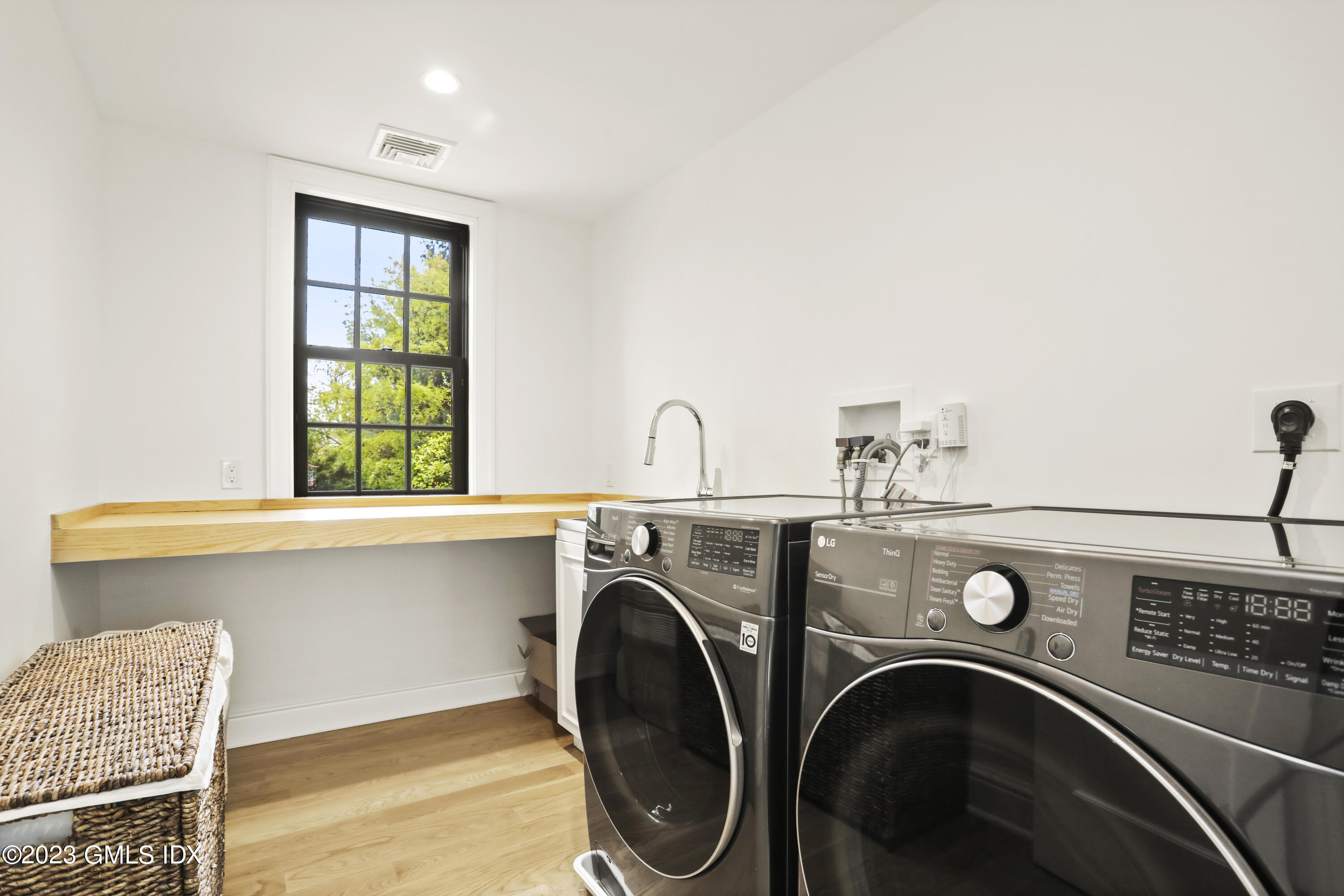2 Northridge Road Old Greenwich, CT 06870 - Photo 30 of 43 a utility room with dryer and washer