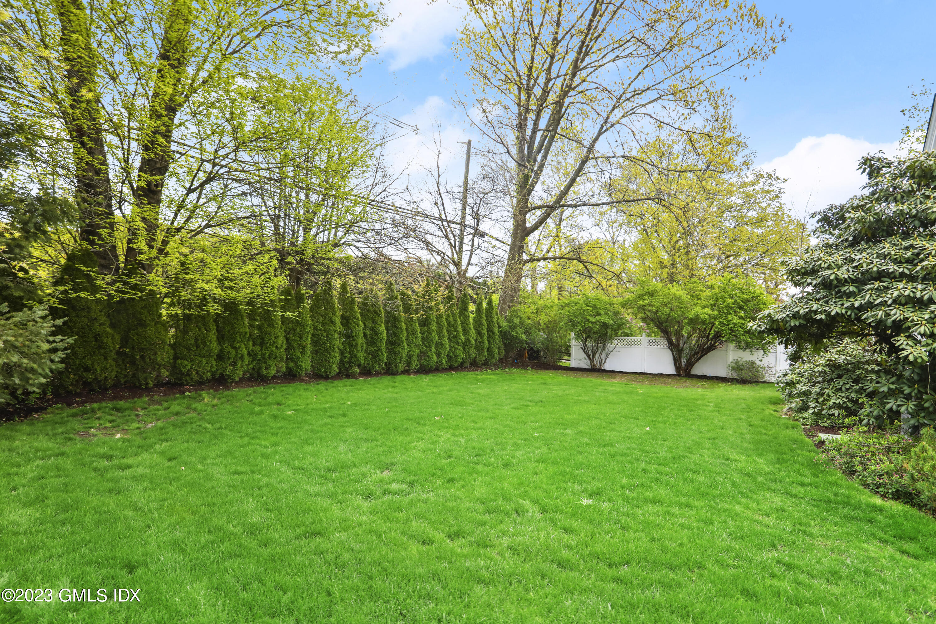 2 Northridge Road Old Greenwich, CT 06870 - Photo 35 of 43 a view of a lush green space