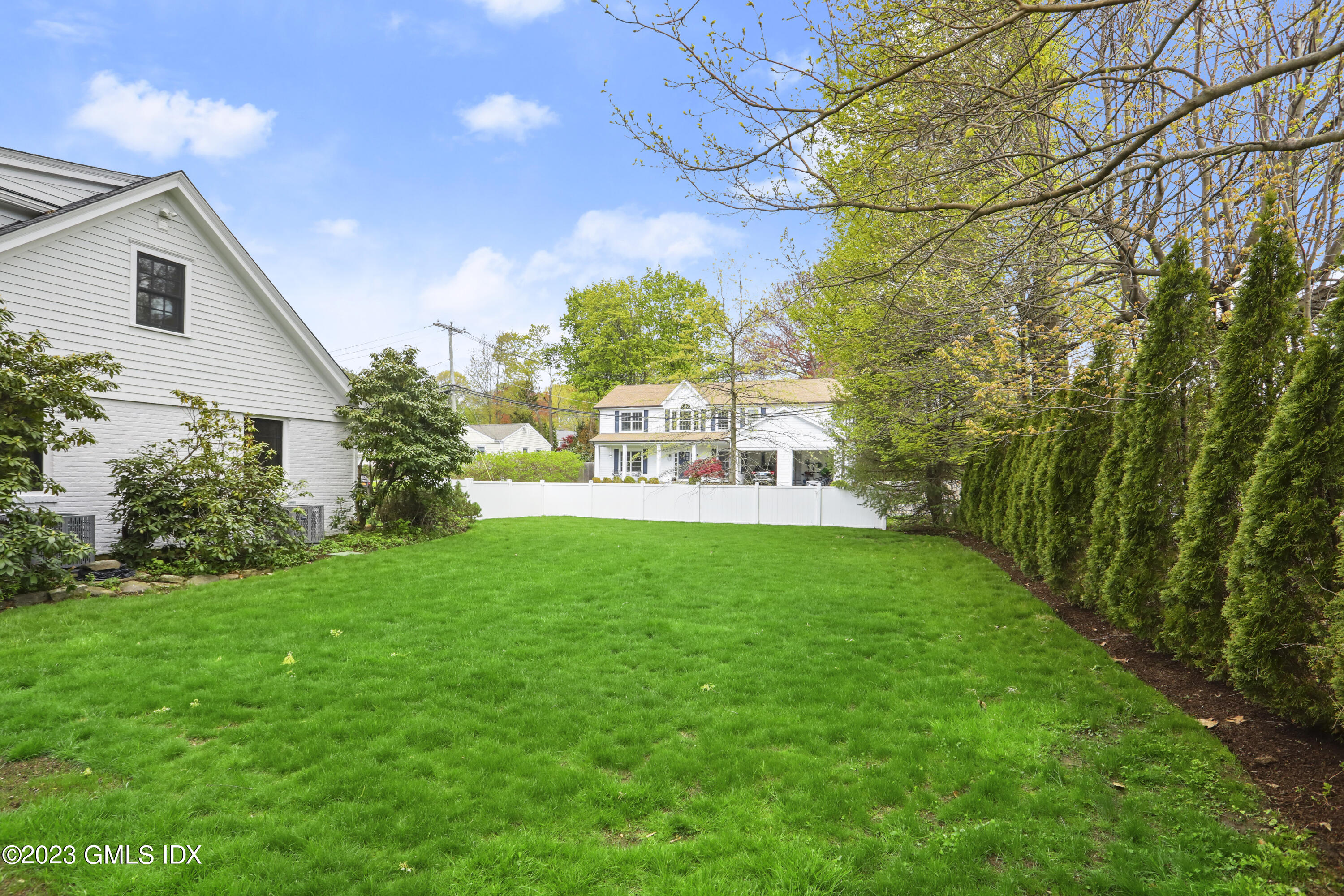 2 Northridge Road Old Greenwich, CT 06870 - Photo 36 of 43 a view of house with backyard and garden