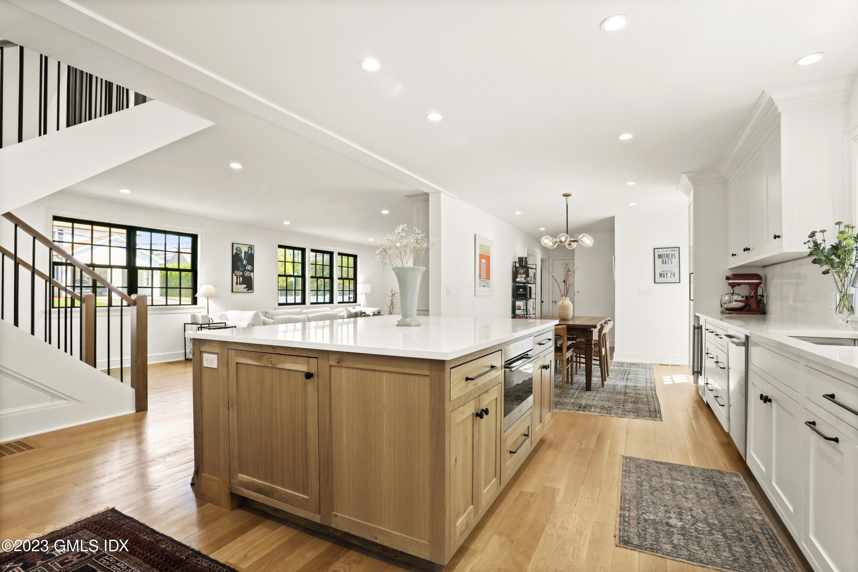 2 Northridge Road Old Greenwich, CT 06870 - Photo 7 of 43 a large kitchen with stainless steel appliances lots of counter space and wooden floor