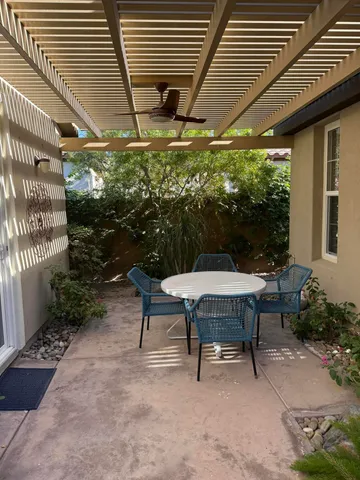 a table and chairs in a patio