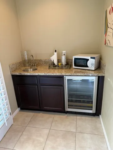 a room with a sink and a stove