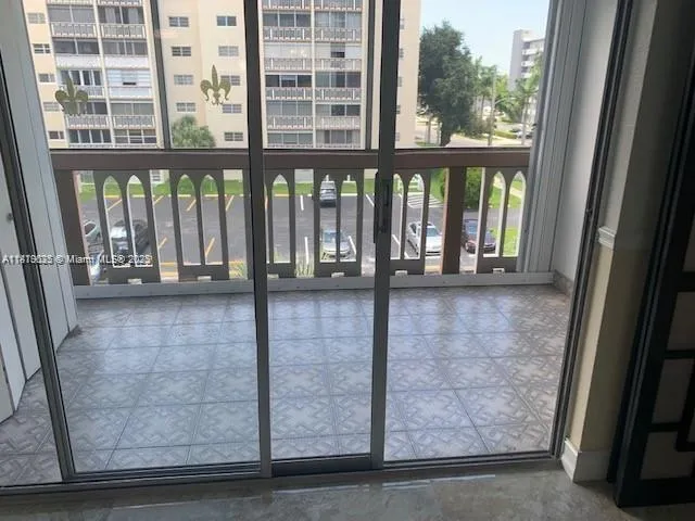 a view of a building from a balcony