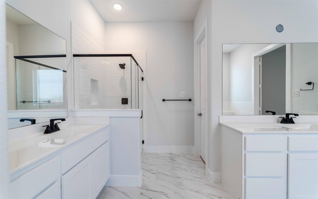 2012 Casting Ridge Mesquite, TX 75181 - Photo 16 of 28 a bathroom with a sink and a mirror