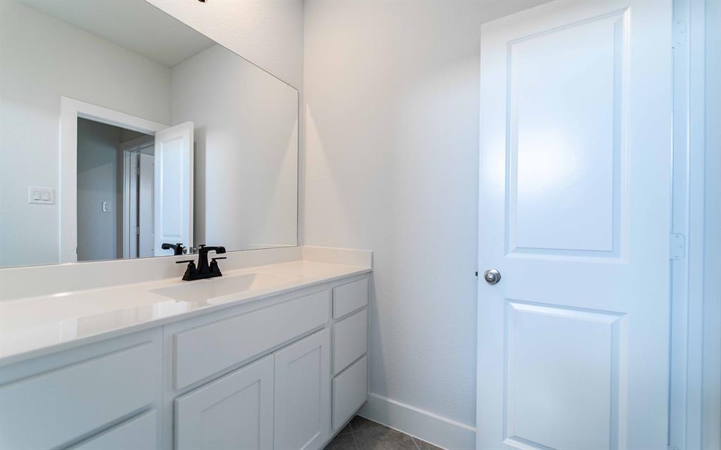 2012 Casting Ridge Mesquite, TX 75181 - Photo 19 of 28 a bathroom with a sink and a mirror