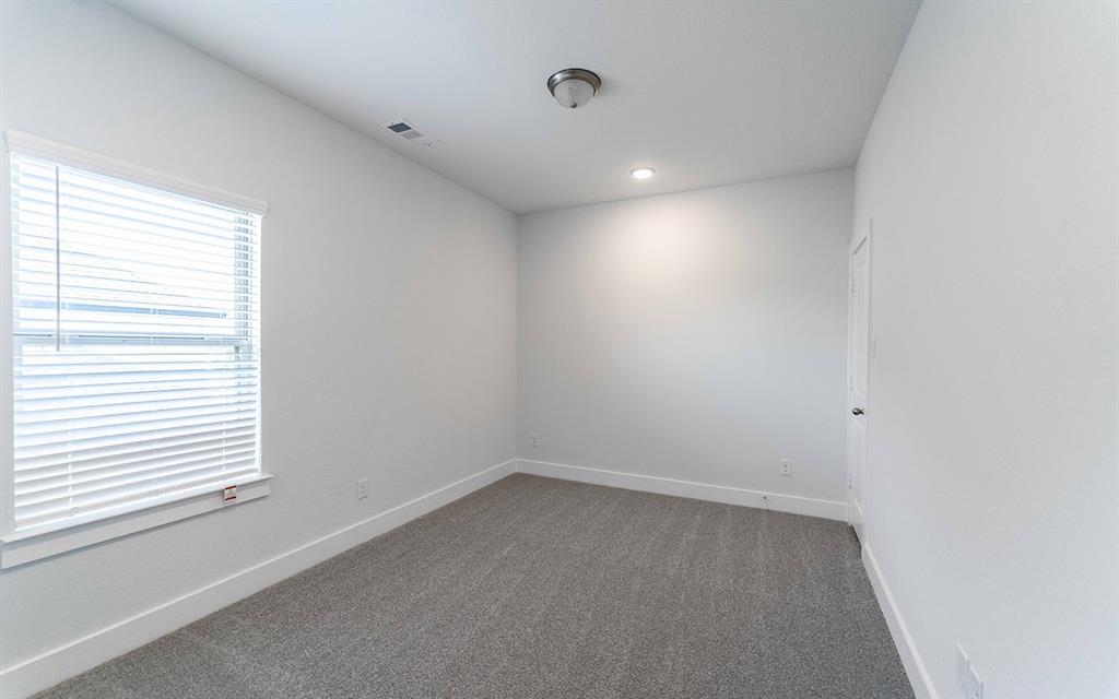 2012 Casting Ridge Mesquite, TX 75181 - Photo 23 of 28 an empty room with a window