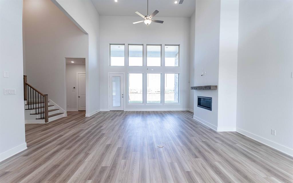 2012 Casting Ridge Mesquite, TX 75181 - Photo 5 of 28 wooden floor in an empty room with a window