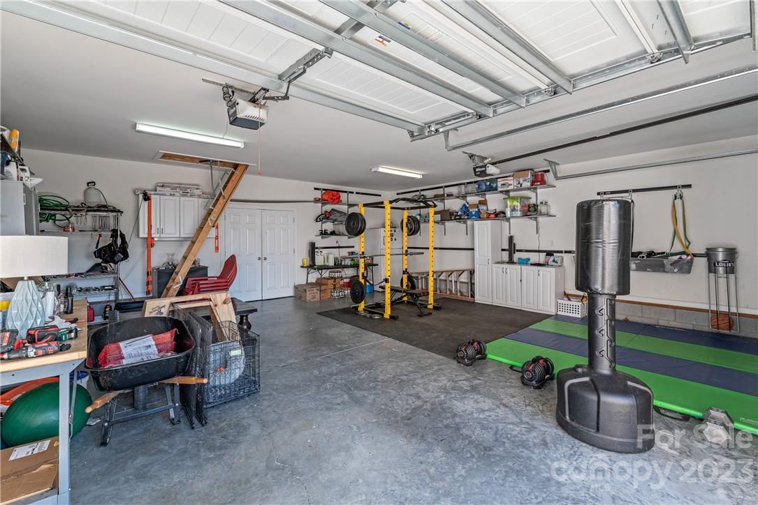 13801 East Rocky River Road Davidson, NC 28036 - Photo 10 of 42 a view of a room with gym equipment