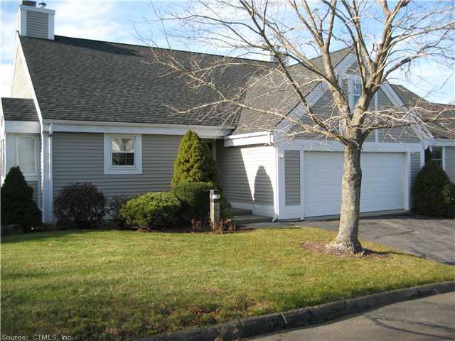 238 Legend Hill Road, Unit 238 Madison, CT 06443 - Photo 1 of 1 a view of a house with backyard and garden