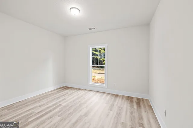 an empty room with a window