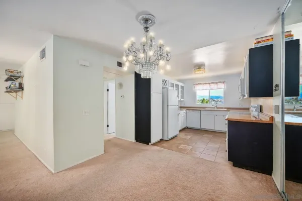 a view of a kitchen and a sink