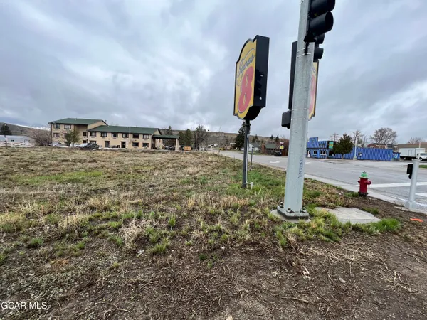 a view of a big yard next to a yard