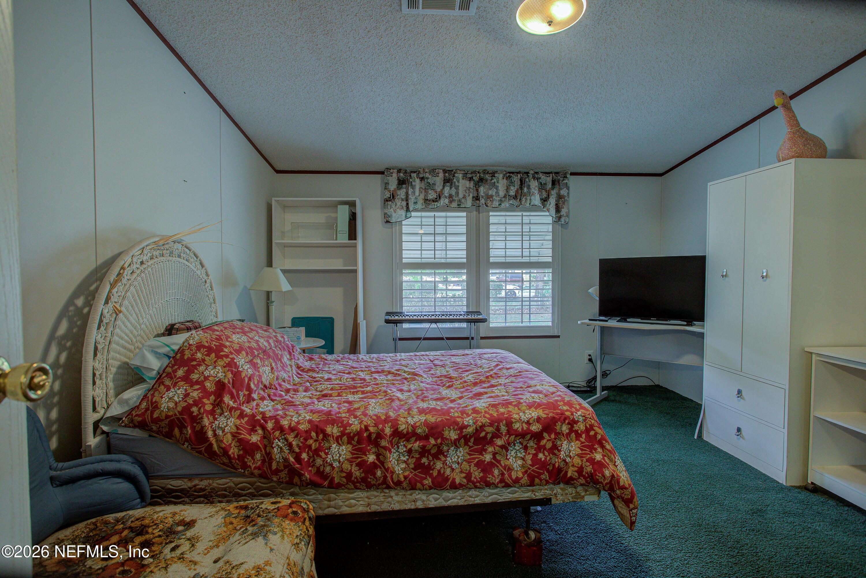 28050 Roundup Place Hilliard, FL 32046 - Photo 21 of 43 20260402-28050_Roundup_Pl-43
