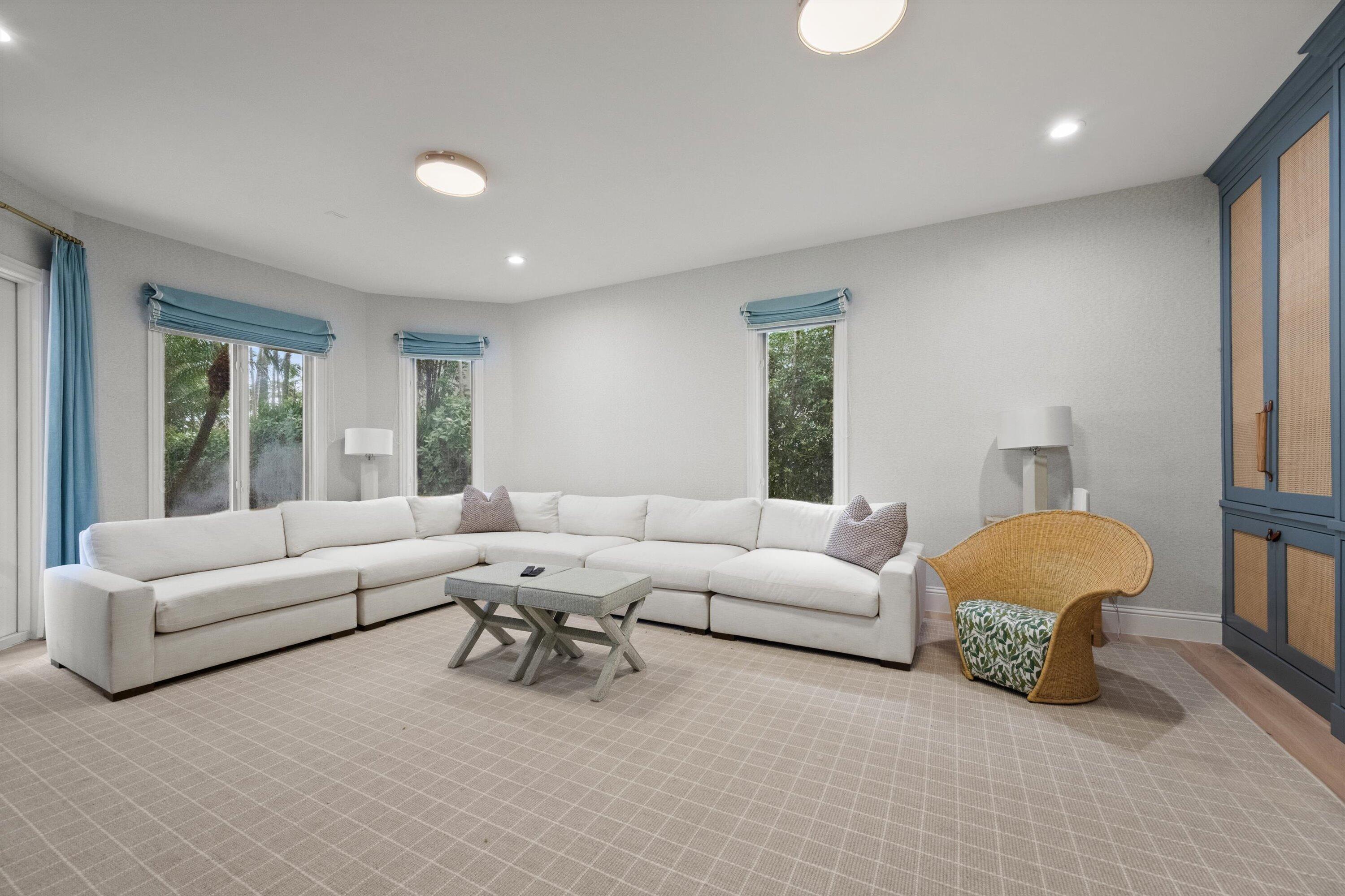 2270 Wilsee Road Palm Beach Gardens, FL 33410 - Photo 28 of 49 a living room with furniture and a large window
