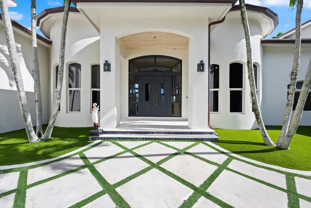a view of front door of house with yard