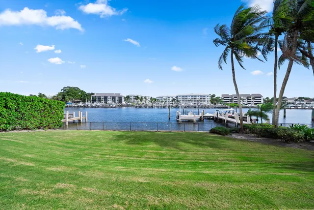 a view of a lake with a garden