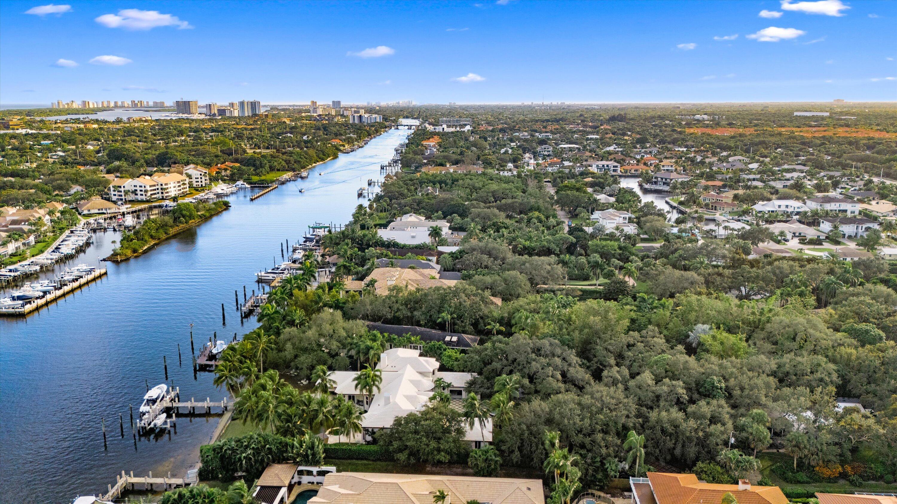 2270 Wilsee Road Palm Beach Gardens, FL 33410 - Photo 49 of 49 an aerial view of residential building and lake