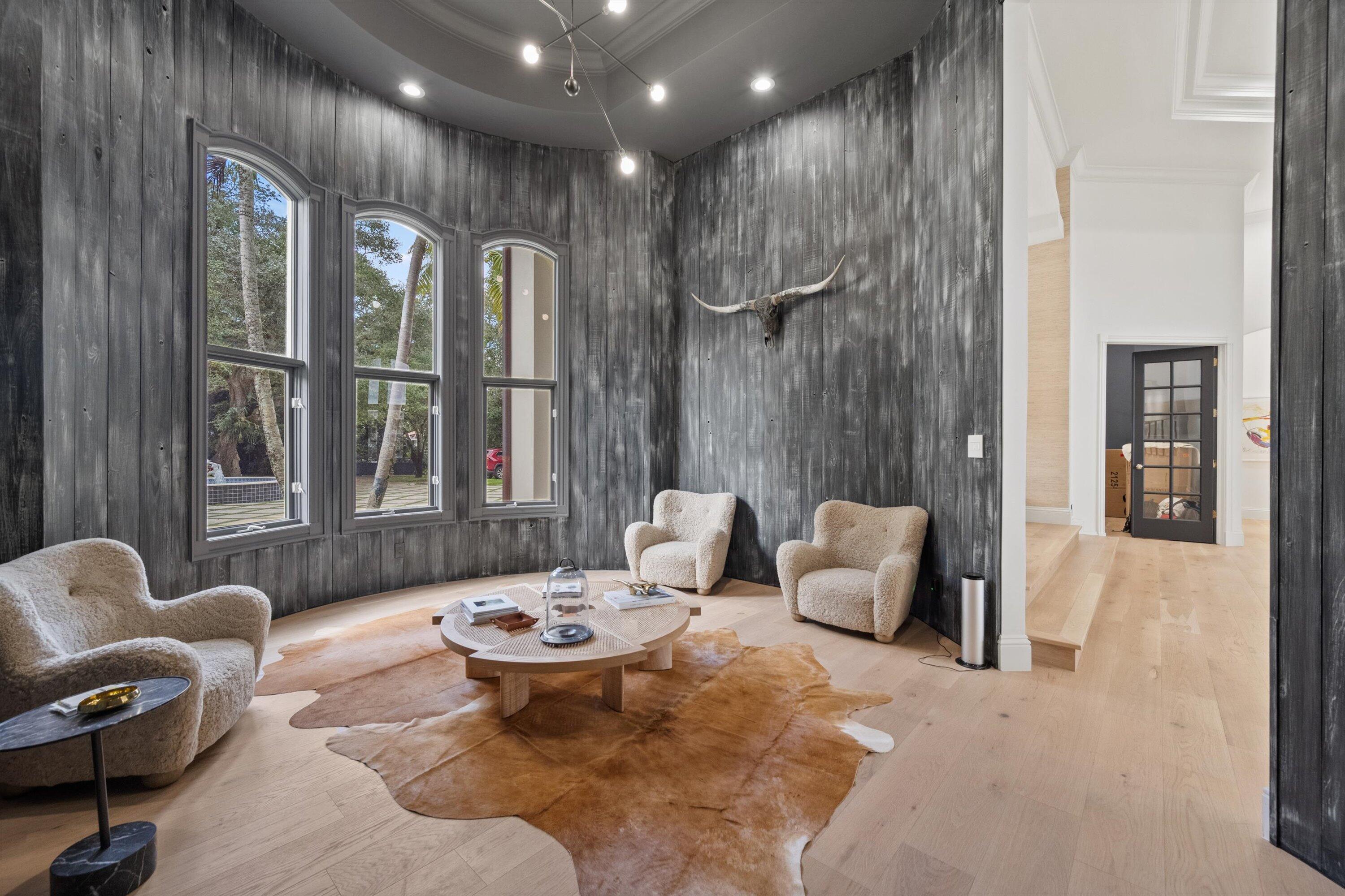 2270 Wilsee Road Palm Beach Gardens, FL 33410 - Photo 6 of 49 a living room with furniture and a large window