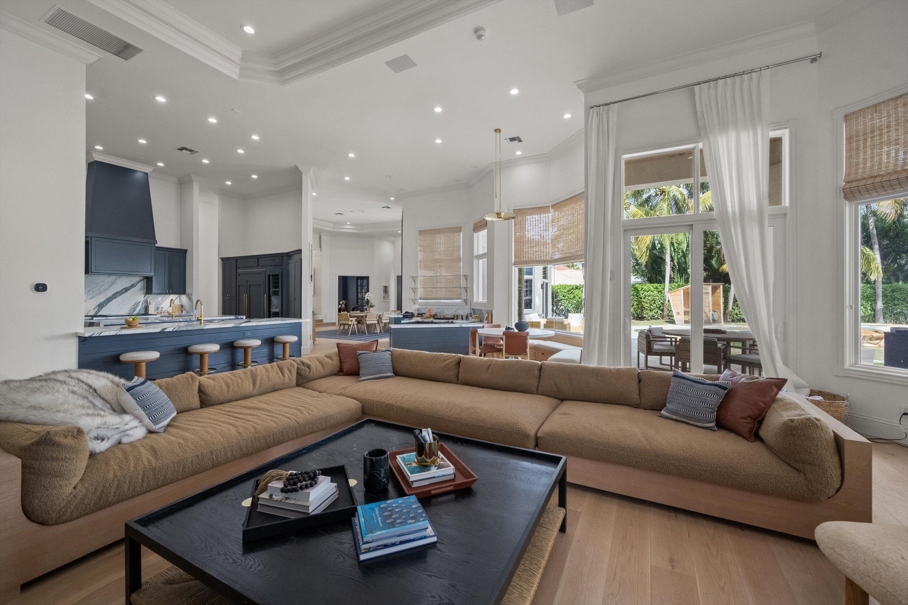 2270 Wilsee Road Palm Beach Gardens, FL 33410 - Photo 9 of 49 a living room with furniture and a large window