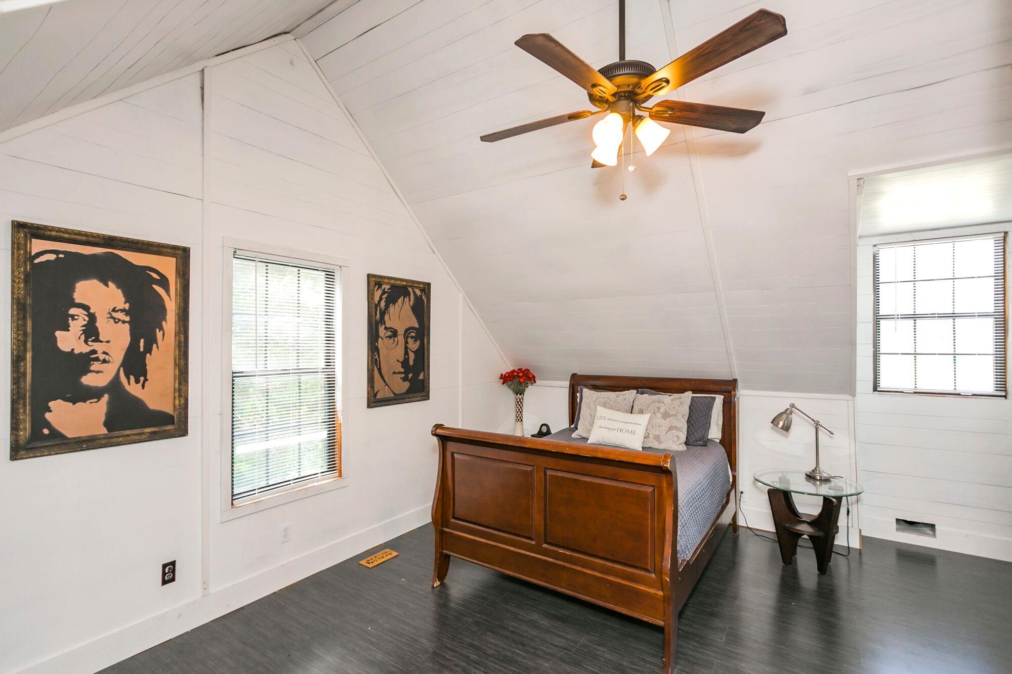 7690 Joe Rowlin Road Christiana, TN 37037 - Photo 14 of 18 a bedroom with furniture and window