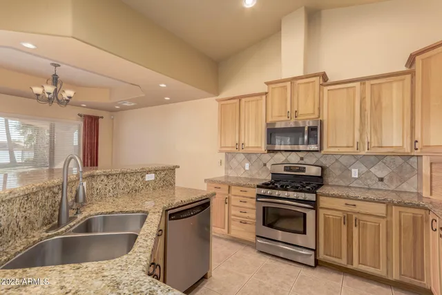 a bathroom with a sink a mirror and a toilet