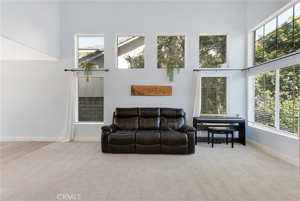 3843 San Gabriel Street Simi Valley, CA 93063 - Photo 13 of 52 a living room with furniture and a window