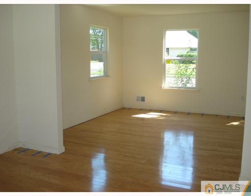 8 Markham Road Edison, NJ 08817 - Photo 6 of 7 a view of empty room with window