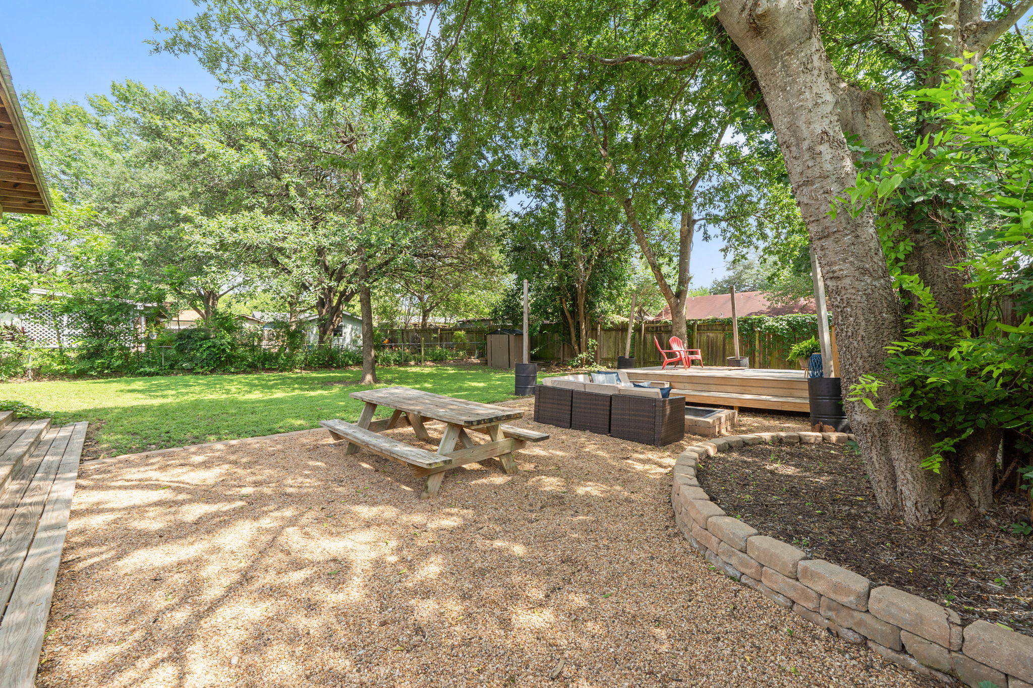 705 Dulwich Street Austin, TX 78748 - Photo 25 of 36 A well-landscaped yard provides ample space for relaxation and outdoor entertaining.