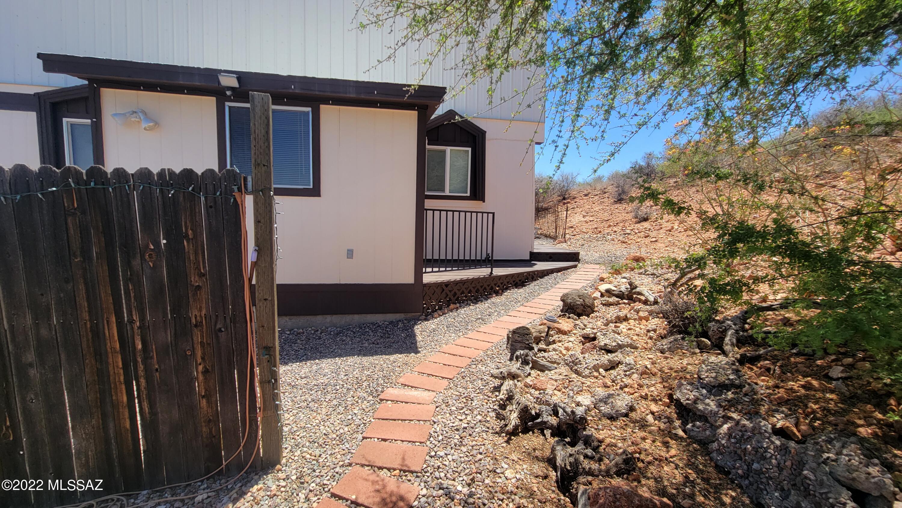 3399 Red Stag Road Pearce, AZ 85625 - Photo 13 of 47 a view of backyard with pathway