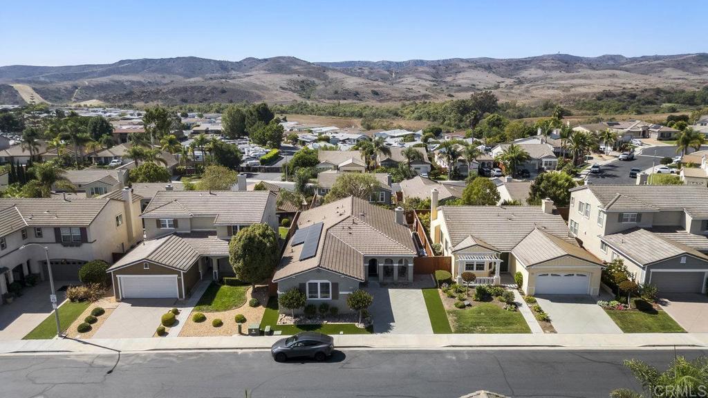 1113 Teal Way Oceanside, CA 92057 - Photo 2 of 49 an aerial view of residential houses and street