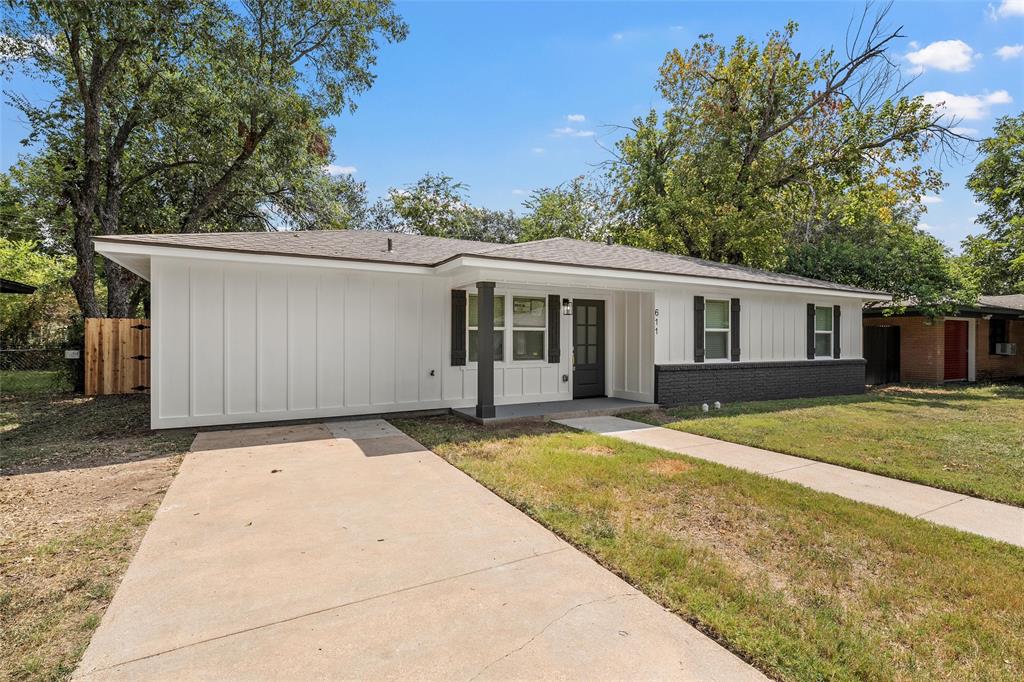 611 North Rita Street Lacy-Lakeview, TX 76705 - Photo 2 of 17 View of front facade featuring board and batten siding, roof with shingles, brick siding, and a porch