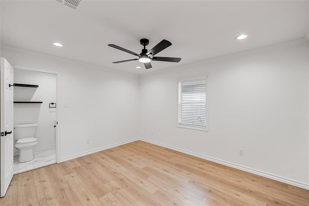 611 North Rita Street Lacy-Lakeview, TX 76705 - Photo 8 of 17 Unfurnished bedroom featuring ornamental molding, light wood-type flooring, a ceiling fan, and recessed lighting