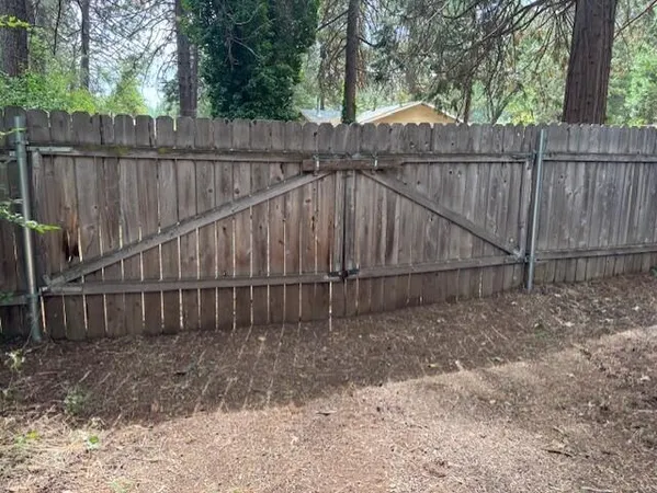 a view of deck with wooden fence