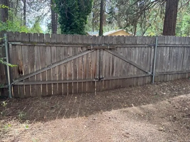 a view of deck with wooden fence