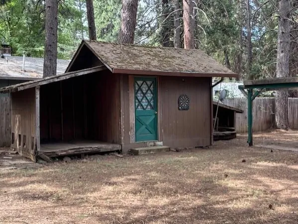 a view of outdoor space and front view of a house