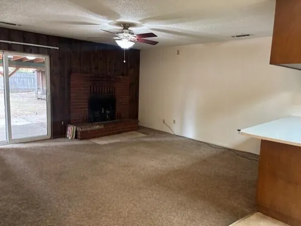 a view of a livingroom with a fireplace