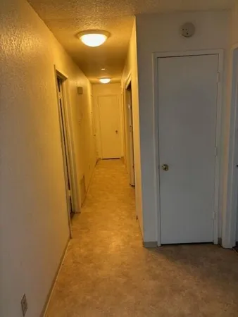 a view of hallway with shower