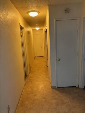 a view of hallway with shower