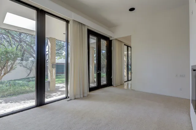 a kitchen with stainless steel appliances granite countertop a stove and a refrigerator
