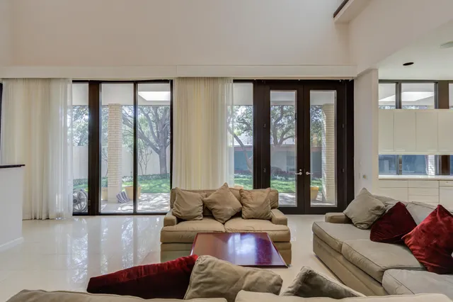 a bedroom with a bed and a walk in closet