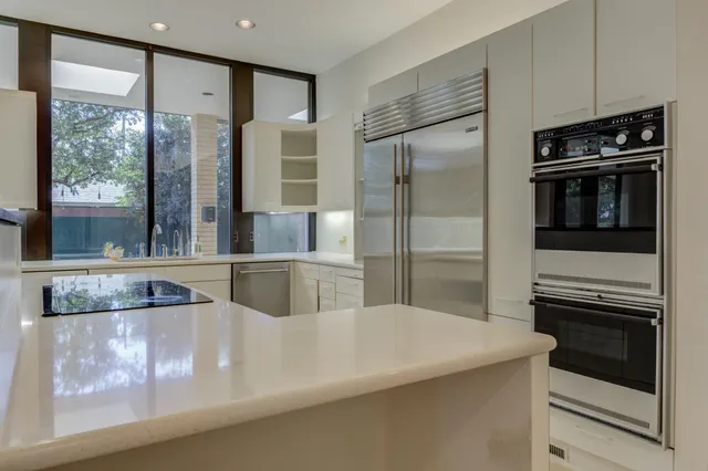 a room with gym equipment and a mirror