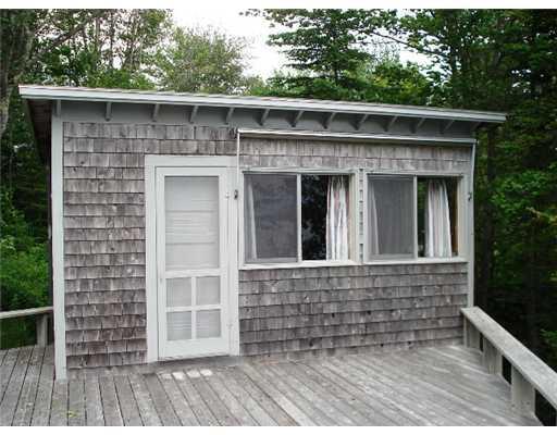 100 Clark Point Road Bernard, ME 04612 - Photo 3 of 6 Exterior Front. Sleeping cottage...