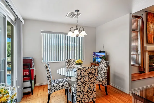 a bathroom with a tub and a window
